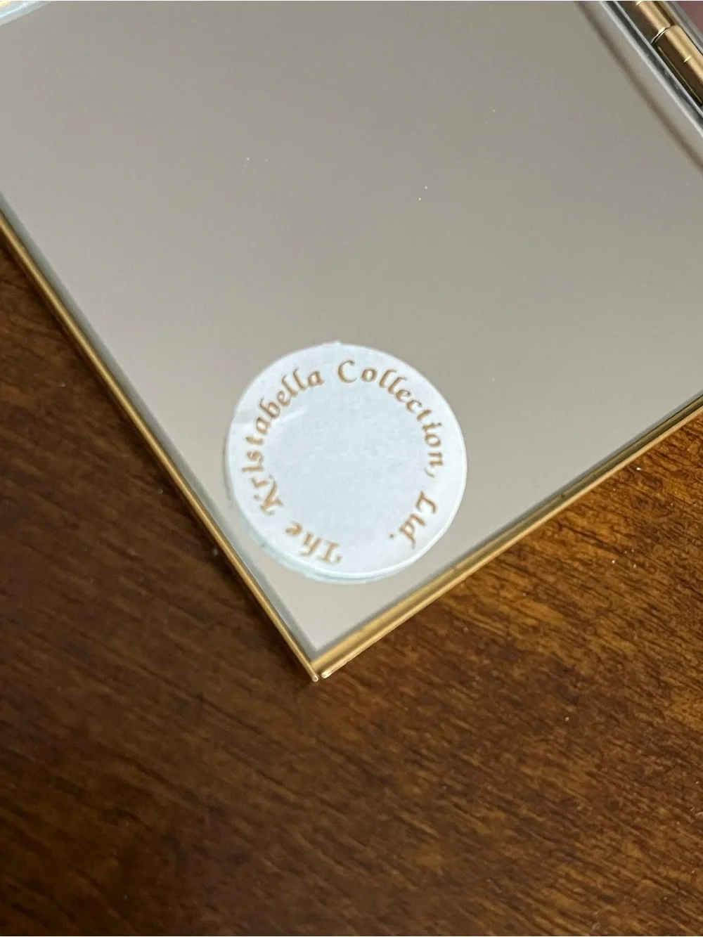 Woman’s glass mirror